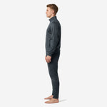 Custom grey soccer tracksuit side profile showing athletic cut jacket and slim-leg pants for men