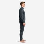Men's grey soccer tracksuit side view displaying stand collar full-zip jacket and tapered charcoal pants
