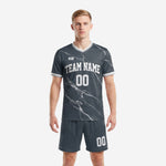 Custom charcoal marble-print soccer uniforms for teams, front view with team name and number