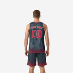 Reverse side view of charcoal and red basketball uniform set showing clean side panels and elastic waistband detail on matching shorts