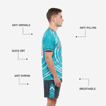Charcoal soccer shorts with teal and white chevron side panels and player number on thigh