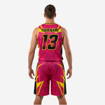 Close detail of cheap basketball uniform jersey showing gold number and yellow geometric panel design