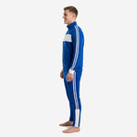 Right side view of custom blue soccer tracksuit in Royal Blue with white stand collar and tapered pant cut on adult male model