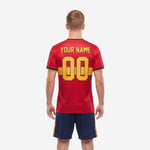 Red soccer uniform jersey chest detail showing Athletic Gold team name player number and sublimated diamond pattern across shoulders