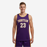 Custom club basketball jerseys in purple and gold with arced team name and front number 23, front and back view on adult male model