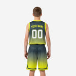 Back view of custom kids basketball uniforms showing upper back number placement on charcoal-to-neon gradient jersey