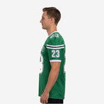 Right side view of custom 7 on 7 football jersey in kelly green showing sleeve number placement and athletic cut