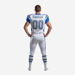 Back view of custom 7v7 football uniforms showing back number nameplate area on white sublimated jersey with matching blue and white pants