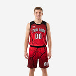 Custom adult league basketball uniforms in red and black lightning pattern - front view of full two-piece set with team name and number 00