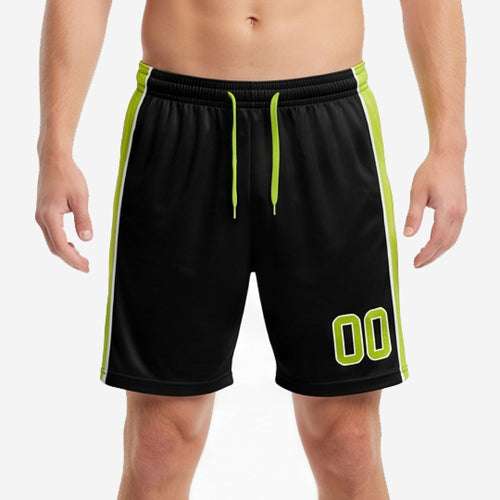 Custom all black soccer shorts with lime green side panels and player number on right leg, front view