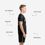 Back view of custom all black soccer uniforms set with player name and number printed in white sublimation