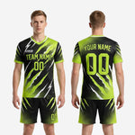 Custom all black and neon green soccer uniform back view showing player number and surname print zones