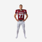 Custom american football kits in crimson and white, front view showing arced team name and number 77 on sublimated jersey with matching white pants and double side stripe