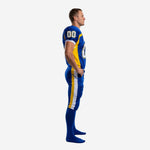 Side view of blue and gold custom American football uniform showing gold triangular shoulder panel, matching gold and white dual leg stripe on full-length tackle pants