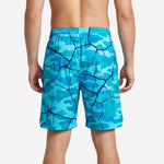 Custom aqua blue camo basketball shorts front view showing navy crackle pattern print across the full surface and player number placement