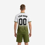 Army green and white custom soccer uniform jersey front detail showing pixel-scatter sublimation print and team name placement zone