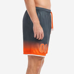 Custom orange soccer shorts side left view showing full gradient fade from charcoal waistband to orange hem