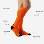 Custom Athletic Orange soccer socks heel and toe detail showing reinforced double-knit Jet Black contrast zones