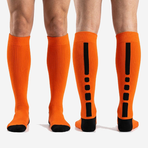 Custom Athletic Orange soccer socks pair flat lay showing full over the calf length and solid orange body