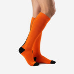 Custom Athletic Orange soccer socks right side view showing over the calf length and black heel contrast panel