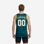 Right side view of custom teal basketball jersey displaying peacock feather graphic with blue and green iridescent eye detail on side panel