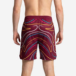 Back view of custom basketball practice shorts in maroon showing swirl print and player number placement on rear panel