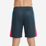 Opposite side view of charcoal custom basketball shorts with gradient stripe running teal through purple to hot pink along the full leg panel