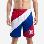 Custom basketball shorts for teams in diagonal red, white, and royal blue color block with player number 00 on front leg panel