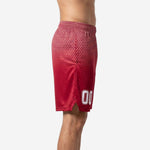 Side view of custom basketball shorts for teams in red hex fade showing side split at hem and waistband detail