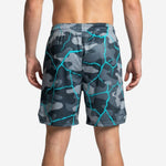 Opposite side view of custom grey camo basketball shorts for teams with bold teal lightning detail across full panel