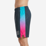 Side view of custom basketball shorts showing full-length teal-to-pink gradient side stripe with small hem split and elastic drawcord waistband