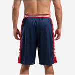 Personalized basketball shorts opposite side view showing navy star-texture leg panel and full-length red side panel with sublimated team name