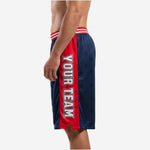 Navy and red custom basketball shorts side view showing elastic waistband with 3 white stripes and red base plus hem side split detail