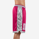 Side view of pink and silver custom basketball shorts showing full-length silver circuit-board side panel, elastic waistband stripe, and hem trim split