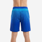 Right side view of custom basketball shorts showing royal blue to cyan gradient hex pattern and athletic mid-thigh length