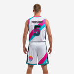 White and pink sublimated basketball uniform set with retro sunset gradient graphic on shorts thigh