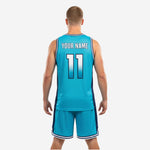 Close-up of sublimated wave graphic on teal custom basketball uniform jersey chest panel