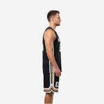 Front view of custom basketball uniforms for leagues with black body, gold V-neck binding, white team name, and front number 23