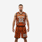 Custom basketball uniforms with logo in orange and black tiger stripe sublimation, front view of full 2-piece set with tiger face graphic and number 22