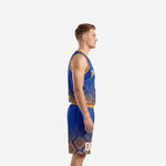 Front view of custom basketball uniforms with names and numbers showing gold V-neck binding, arced team name, and white front number on royal blue jersey with matching shorts