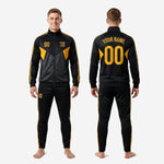 Full custom black and gold soccer tracksuit set showing jacket and matching tapered pants in full-dye sublimation print