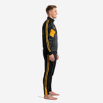 Black and gold soccer tracksuit side view showing twin Athletic Gold sleeve and pant leg stripes on men's full set