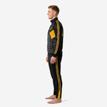 Men's custom black and gold soccer tracksuit side profile view highlighting tapered pant cut and gold stripe detail