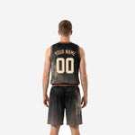 Opposite side view of custom black basketball uniform displaying star field detail and gold-copper waistband stripe on matching basketball shorts