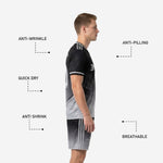 Custom black and gray soccer kit full 2-piece set with team name chest print and matching gradient sublimation
