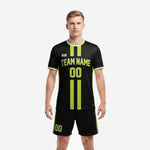 Custom all black soccer uniform with lime green vertical stripes and matching shorts, front view on male model