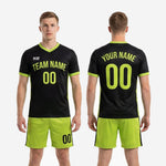Full custom black and green soccer uniform kit set including sublimated jersey and matching shorts for team orders
