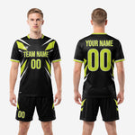 Full back view of custom all black soccer uniform set showing back number and surname print zones in neon green