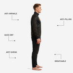 Custom black soccer tracksuit pants with orange chevron sublimation print and ribbed ankle cuff on tapered athletic fit leg