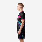 Custom black and pink soccer uniform right side view showing hot pink collar trim and full ray-burst sublimation print on black kit